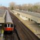 A photo of an Orange Line train pulling into a station in Boston.